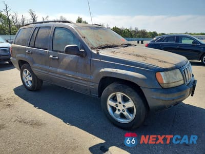 Czwarte zdjęcie samochodu z boku: 2002 JEEP GRAND CHEROKEE LIMITED VIN:1J8GW58NX2C225336 - miniatura