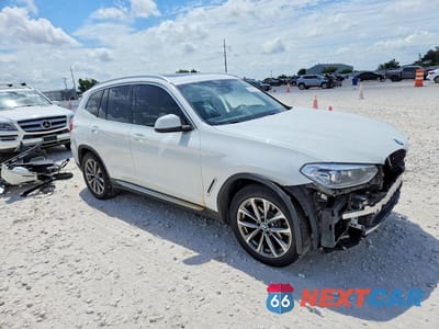 Czwarte zdjęcie samochodu z boku: 2019 BMW X3 XDRIVE30I VIN:5UXTR9C58KLP87262 - miniatura