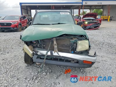 Piąte zdjęcie samochodu w środku: 1999 TOYOTA TACOMA BASE VIN:4TANL42N8XZ539710 - miniatura
