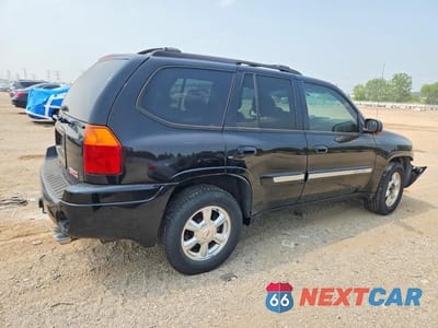 Trzecie zdjęcie samochodu z tyłu: 2004 GMC ENVOY VIN:1GKDT13S342370997 - miniatura