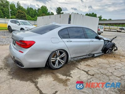 Trzecie zdjęcie samochodu z tyłu: 2019 BMW 740 I VIN:WBA7E2C50KB454272 - miniatura