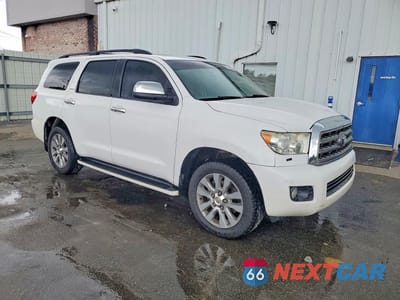 Czwarte zdjęcie samochodu z boku: 2014 TOYOTA SEQUOIA LIMITED VIN:5TDKY5G12ES055373 - miniatura