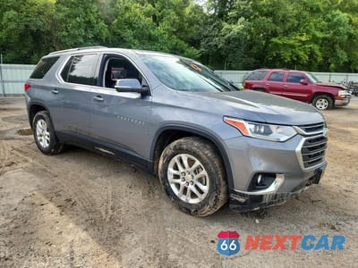 Czwarte zdjęcie samochodu z boku: 2019 CHEVROLET TRAVERSE LT VIN:1GNERGKW4KJ256474 - miniatura