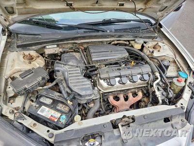 Zdjęcie 11 z 12 samochodu: 2002 HONDA CIVIC LX VIN:1HGEM225X2L006499 - miniatura