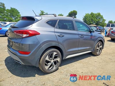 Trzecie zdjęcie samochodu z tyłu: 2017 HYUNDAI TUCSON VIN:KM8J3CA26HU416258 - miniatura