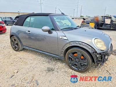 Czwarte zdjęcie samochodu z boku: 2010 MINI COOPER S VIN:WMWMS3C58ATY50623 - miniatura