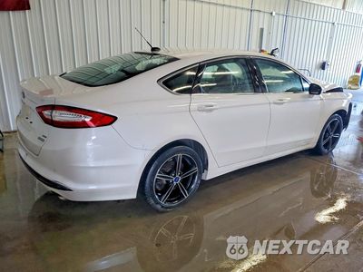 Trzecie zdjęcie samochodu z tyłu: 2016 FORD FUSION SE VIN:3FA6P0HD0GR379630 - miniatura