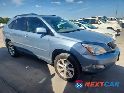 Czwarte zdjęcie samochodu z boku: 2009 LEXUS RX 350 VIN:2T2GK31U39C081117 - miniatura
