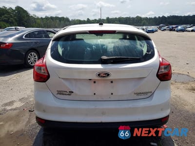 Zdjęcie 6 z 12 samochodu: 2013 FORD FOCUS TITANIUM VIN:1FADP3N23DL141969 - miniatura
