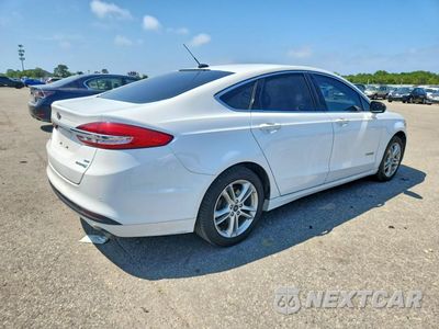 Trzecie zdjęcie samochodu z tyłu: 2018 FORD FUSION SE HYBRID VIN:3FA6P0LU2JR163504 - miniatura