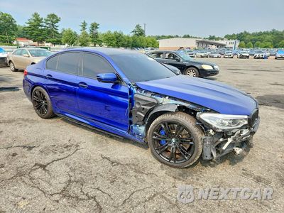 Czwarte zdjęcie samochodu z boku: 2018 BMW M5 VIN:WBSJF0C55JB282189 - miniatura