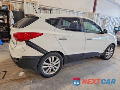 Trzecie zdjęcie samochodu z tyłu: 2012 HYUNDAI TUCSON LIMITED VIN:KM8JUCAC7CU543924 - miniatura