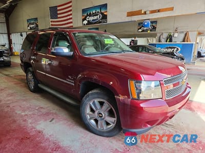 Czwarte zdjęcie samochodu z boku: 2010 CHEVROLET TAHOE K1500 LTZ VIN:1GNUKCE02AR110199 - miniatura