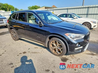 Czwarte zdjęcie samochodu z boku: 2016 BMW X1 XDRIVE28I VIN:WBXHT3C33G5E47698 - miniatura
