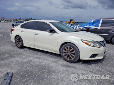 Czwarte zdjęcie samochodu z boku: 2017 NISSAN ALTIMA 2.5 SL VIN:1N4AL3AP8HC164721 - miniatura