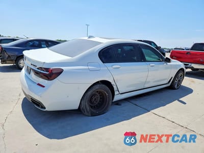 Trzecie zdjęcie samochodu z tyłu: 2018 BMW 750 XI VIN:WBA7F2C53JG423595 - miniatura