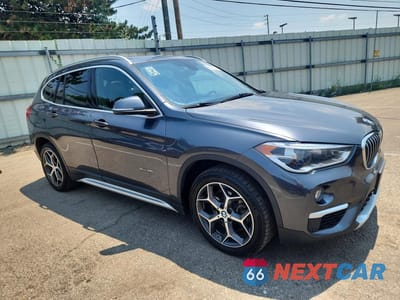 Czwarte zdjęcie samochodu z boku: 2018 BMW X1 XDRIVE28I VIN:WBXHT3C30J5K25396 - miniatura