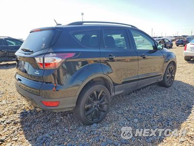 Trzecie zdjęcie samochodu z tyłu: 2017 FORD ESCAPE SE VIN:1FMCU0GDXHUC10504 - miniatura