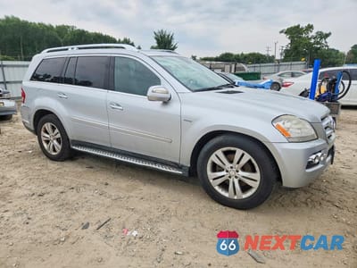 Czwarte zdjęcie samochodu z boku: 2010 MERCEDES-BENZ GL 350 BLUETEC VIN:4JGBF2FEXAA574523 - miniatura