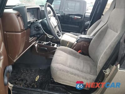 Zdjęcie 7 z 12 samochodu: 2003 JEEP WRANGLER / TJ SPORT VIN:1J4FA49S63P361743 - miniatura