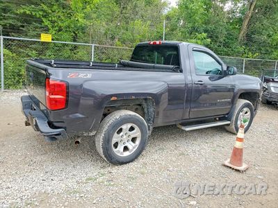 Trzecie zdjęcie samochodu z tyłu: 2016 CHEVROLET SILVERADO K1500 LT VIN:1GCNKRECXGZ303770 - miniatura