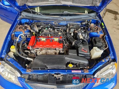 Zdjęcie 11 z 12 samochodu: 2003 MAZDA PROTEGE DX VIN:JM1BJ225231158946 - miniatura