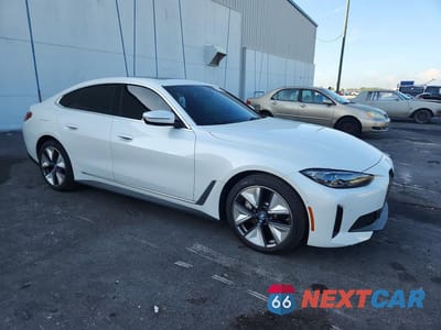Czwarte zdjęcie samochodu z boku: 2022 BMW I4 EDRIVE 40 VIN:WBY73AW02NFM89328 - miniatura