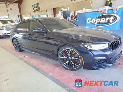 Czwarte zdjęcie samochodu z boku: 2023 BMW M550XI VIN:WBA13BK01PCM43705 - miniatura