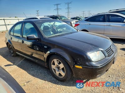 Czwarte zdjęcie samochodu z boku: 2002 VOLKSWAGEN JETTA GLS VIN:3VWSB69M22M121122 - miniatura
