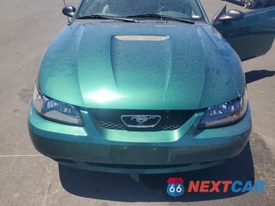 Zdjęcie 11 z 12 samochodu: 2002 FORD MUSTANG VIN:1FAFP44462F233106 - miniatura