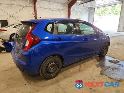Trzecie zdjęcie samochodu z tyłu: 2020 HONDA FIT LX VIN:3HGGK5H42LM703521 - miniatura