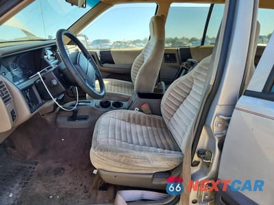 Zdjęcie 7 z 13 samochodu: 1995 JEEP GRAND CHEROKEE LAREDO VIN:1J4GZ58S5SC638375 - miniatura