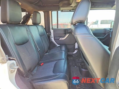 Zdjęcie 11 z 13 samochodu: 2015 JEEP WRANGLER UNLIMITED SPORT VIN:1C4BJWDG4FL568503 - miniatura