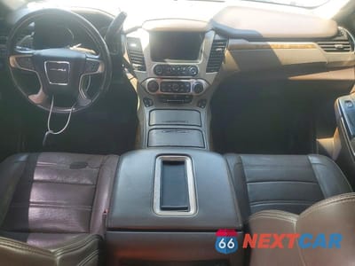 Zdjęcie 8 z 13 samochodu: 2015 GMC YUKON DENALI VIN:1GKS2CKJ1FR163405 - miniatura
