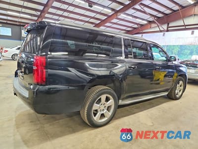 Trzecie zdjęcie samochodu z tyłu: 2015 CHEVROLET SUBURBAN K1500 LT VIN:1GNSKJKC8FR547643 - miniatura