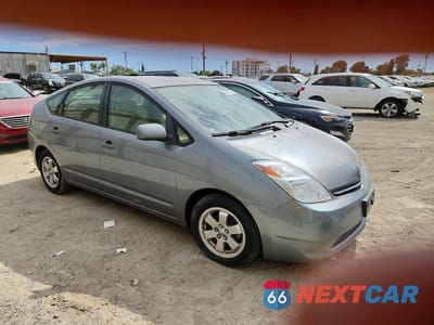 Czwarte zdjęcie samochodu z boku: 2004 TOYOTA PRIUS BASE VIN:JTDKB22U440109243 - miniatura