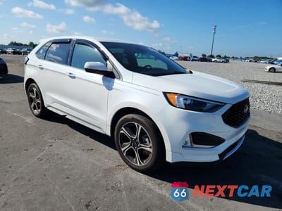Czwarte zdjęcie samochodu z boku: 2023 FORD EDGE ST VIN:2FMPK4AP4PBA49315 - miniatura