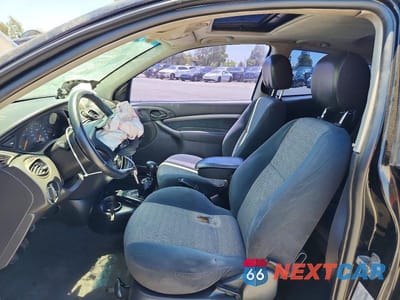 Zdjęcie 7 z 12 samochodu: 2001 FORD FOCUS ZX3 VIN:3FAFP31351R191440 - miniatura
