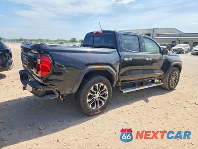 Trzecie zdjęcie samochodu z tyłu: 2025 GMC CANYON DENALI VIN:1GTP2FEK2S1200266 - miniatura
