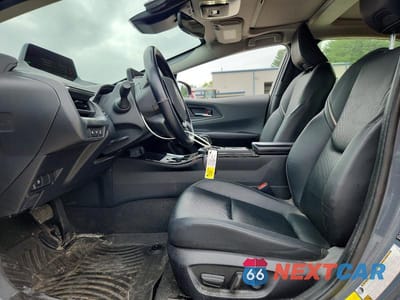 Zdjęcie 7 z 12 samochodu: 2024 TOYOTA PRIUS XLE VIN:JTDADABU6R3015788 - miniatura