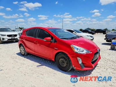 Czwarte zdjęcie samochodu z boku: 2016 TOYOTA PRIUS C TWO VIN:JTDKDTB34G1139722 - miniatura
