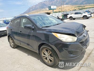 Czwarte zdjęcie samochodu z boku: 2011 HYUNDAI TUCSON GLS VIN:KM8JUCAC1BU121971 - miniatura
