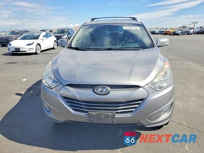 Piąte zdjęcie samochodu w środku: 2013 HYUNDAI TUCSON GLS VIN:KM8JU3AC9DU714304 - miniatura