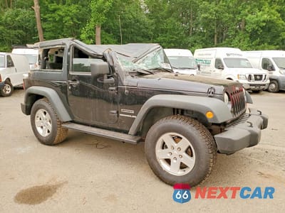 Czwarte zdjęcie samochodu z boku: 2011 JEEP WRANGLER SPORT VIN:1J4AA2D17BL504752 - miniatura