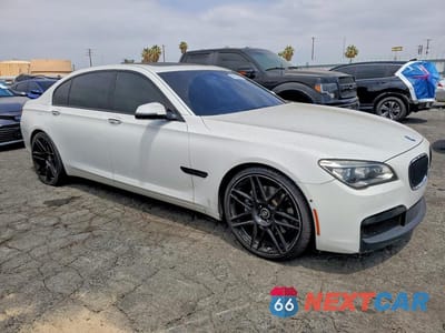 Czwarte zdjęcie samochodu z boku: 2015 BMW 750 LI VIN:WBAYE8C53FD781878 - miniatura