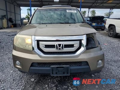 Piąte zdjęcie samochodu w środku: 2011 HONDA PILOT TOURING VIN:5FNYF3H99BB013629 - miniatura