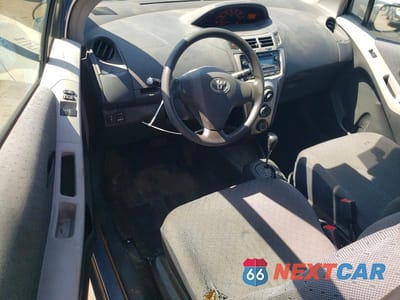 Zdjęcie 8 z 12 samochodu: 2009 TOYOTA YARIS BASE VIN:JTDJT903595230059 - miniatura
