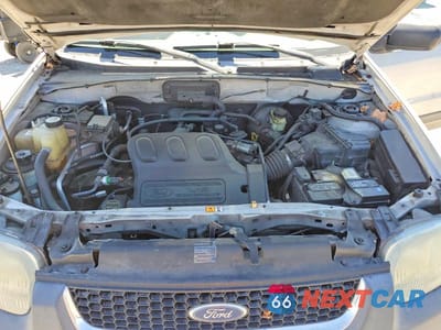 Zdjęcie 12 z 13 samochodu: 2003 FORD ESCAPE XLT VIN:1FMYU03133KD07226 - miniatura