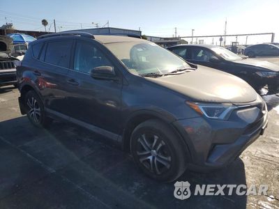 Czwarte zdjęcie samochodu z boku: 2018 TOYOTA RAV4 LE VIN:2T3ZFREV9JW490787 - miniatura