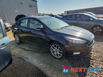 Czwarte zdjęcie samochodu z boku: 2015 FORD FOCUS SE VIN:1FADP3F25FL340166 - miniatura